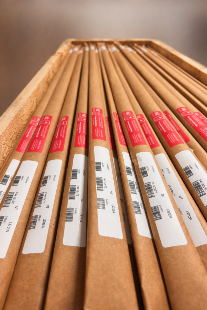 Wrapped steel bars in a wooden crate